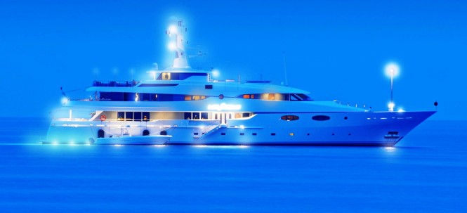 A dazling yacht Lady Sheridan in the evening - Photo by Ric Pilguj