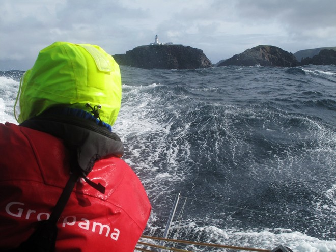 Groupama 70, as they round the turning mark off Muckle Flugga Photo CreditYann Riou Team Groupama