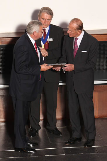 Barry Wade receiving the award from Duke of Edinburgh