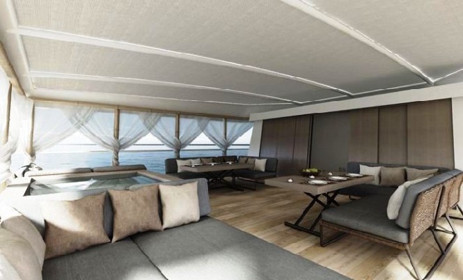 Motor yacht MYSTERE SHADOW’s upper superstructure with a large day lounge covered by a fixed bimini.