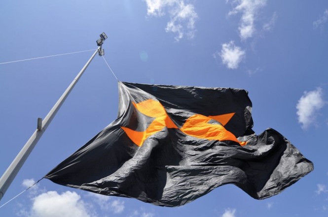 Giant Expo flag flies above hundreds of boats and displays at Coomera