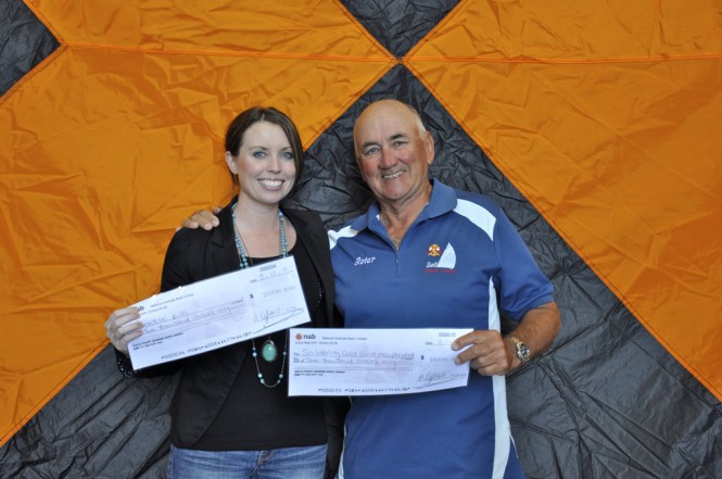 Brodie Sheiles from Paradise Kids and Peter Board from Sailability with their cheques from GCME (2)