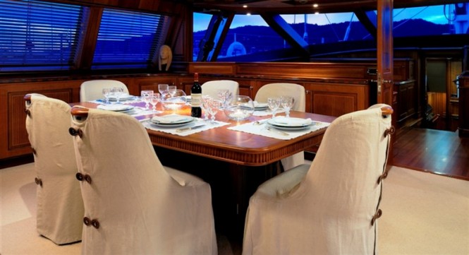 Dining on board of charter yacht Drumbeat