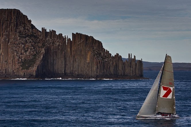 Line Honours Winner sailing yacht WILD OATS XI passing Tasmania's iconic Organ Pipes Photo By Rolex  Carlo Borlenghi