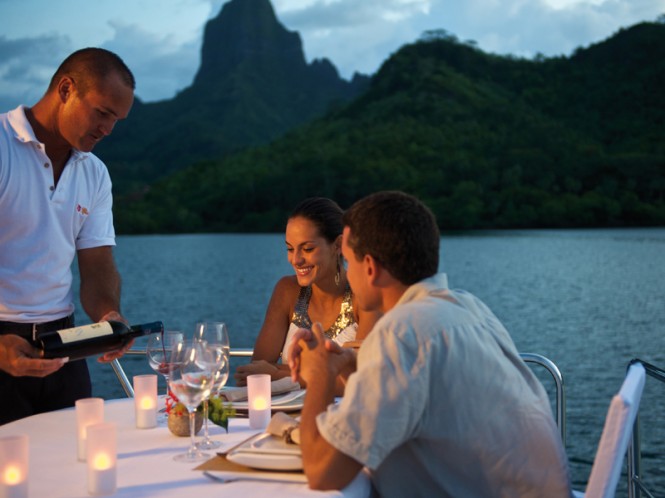 Dining on board of Miss Kulani charter yacht - Photo by Tim McKenna Photography©