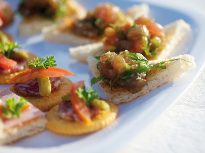 Refreshment on board charter yacht MISS KULANI in TAHITI - Photo by Tim McKenna Photography©