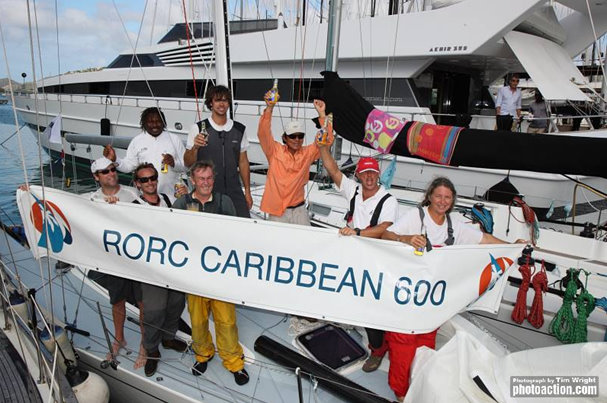 Mumm 36 sailing yacht High Tension crew celebrating arrival Credit Tim Wright Photoaction