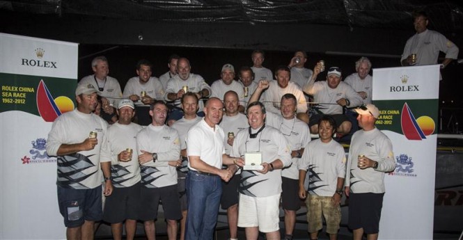 Wolfgang Weibach (Rolex Philippines) and Geoff Hill with GENUINE RISK crew Photo by RolexDaniel Forster