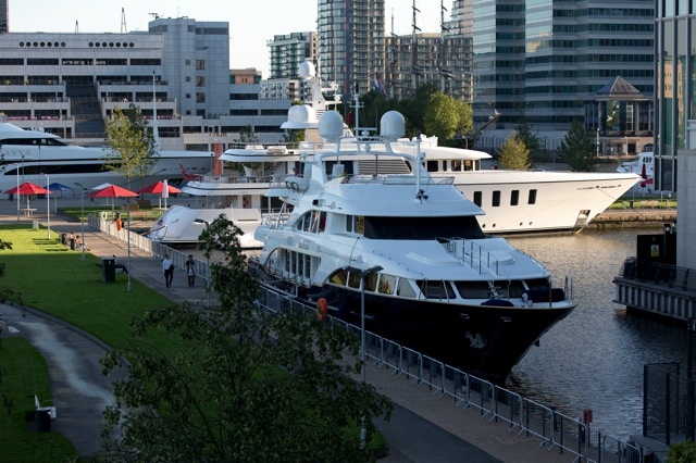 Superyachts berthed in the Thames
