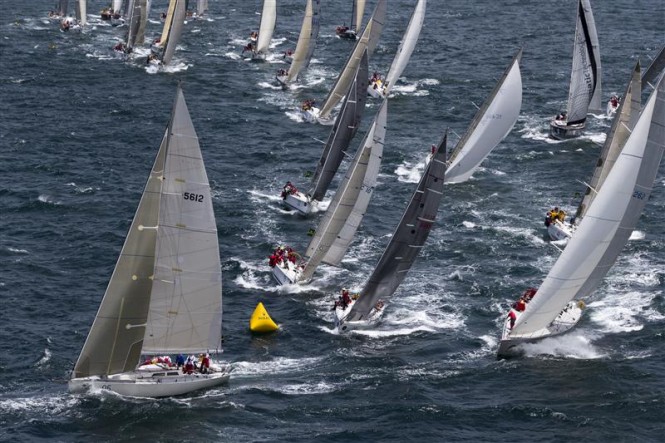 Fleet leaving Sydney Harbour after start of 68th Rolex Sydney Hobart - Photo by Rolex - Carlo Borlenghi