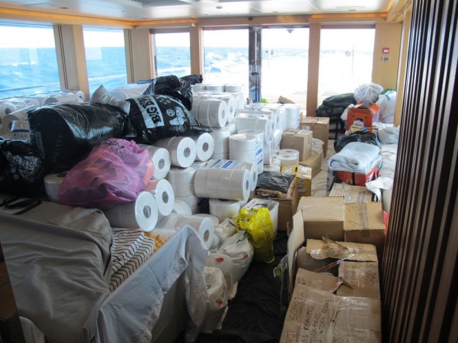 Luxury motor yacht Big Fish loaded with aid