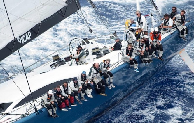 Mike Slade at the helm of his Farr 100, ICAP Leopard  Credit: Ocean Images/Richard Langdon