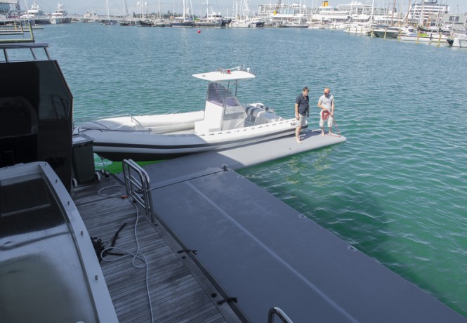 Luxury yacht Ulysses with moored yacht tender