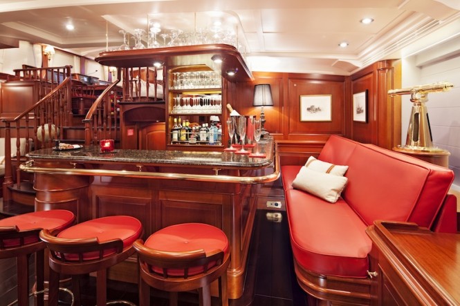 Kamaxitha superyacht - lower salon bar - Photo by Cory Silken