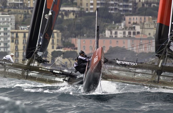 Oracle Team USA and Emirates Team New Zealand in action at ACWS Naples 2012 © FrancescoFerri/Seaway/Nespresso
