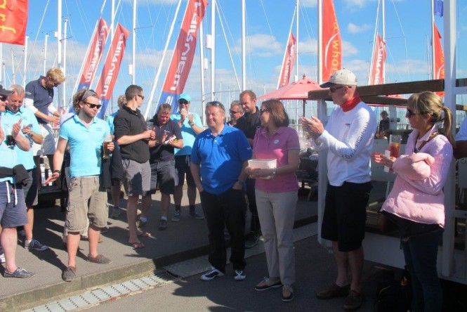 2013 ISS Regatta Kerry Pettitt with Lizette van Niekerk being recognised for MTN's generosity and drawing the first Raffle ticket