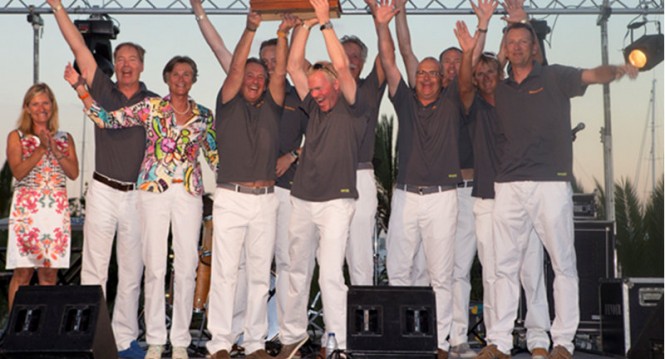 Crew of Heartbeat collecting the Big Bent Cleat Trophy. www.clairematches.com