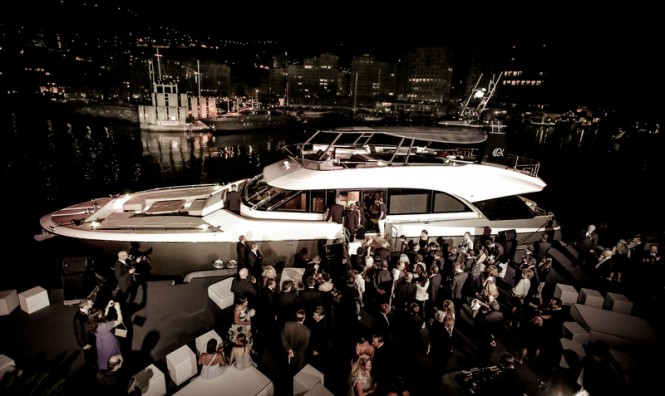 Guests having a closer look at superyacht MCY 86