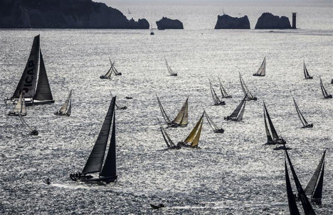 The Rolex Fastnet Race 2013 record breaking fleet passing by The Needles - Photo by Rolex Kurt Arrigo