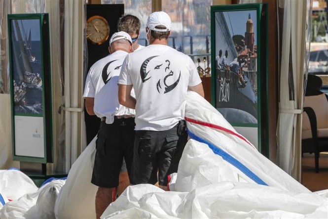 Crew members of Lupa of London yacht during sail measurement on Piazza Azzurra
