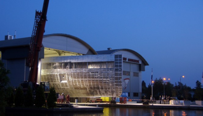 Hull of the 78m superyacht VENUS leaving the shed at the Gouwerok Vries facility