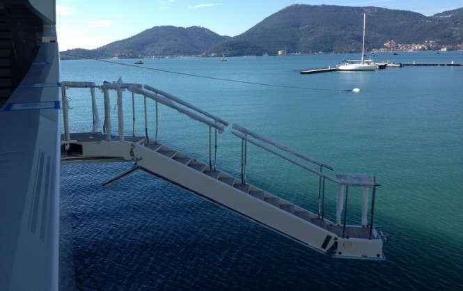 Motor yacht Grace E - the 10.75-meter passerelle deployed