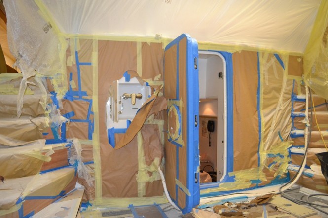 The aft of Infinity Yacht sealed off for the paint work