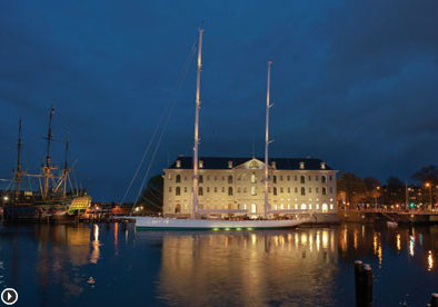 Royal Huisman luxury yacht Kamaxitha in front of the National Maritime Museum in Amsterdam