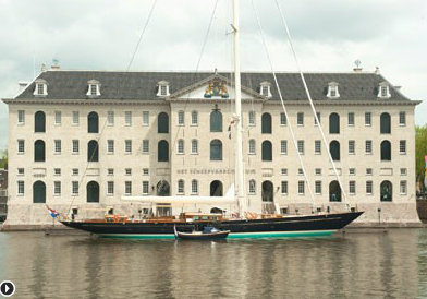 Royal Huisman superyacht Pumula in front of National Maritime Museum