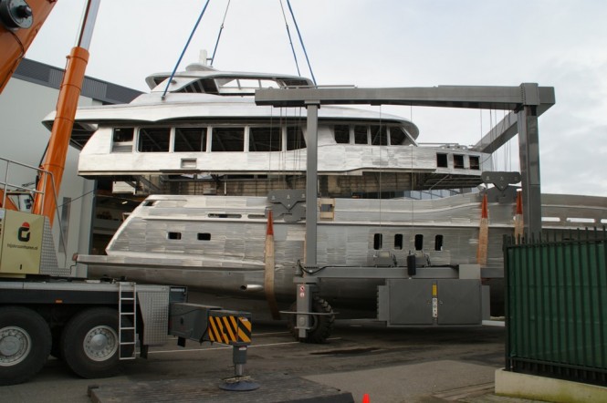 Hull and superstructure of Project Firefly Yacht being joined together