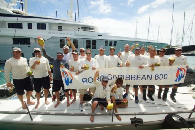George Sakellaris' Shockwave crew celebrate dockside in Antigua after their victorious race   Credit: Kevin Johnson/kevinjohnsonphotography.com 