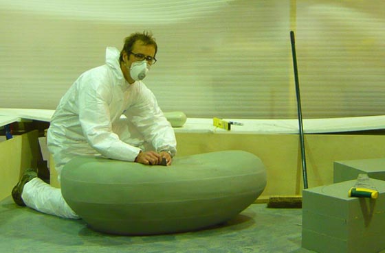 Adam Lay sculpting Inukshuk yacht's saloon ottoman boulders - January 2013