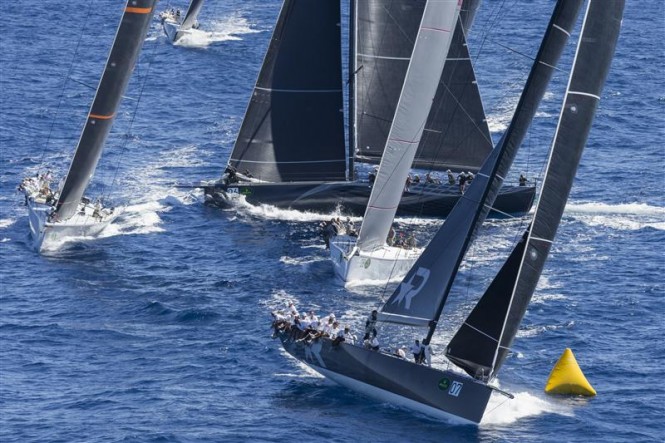 Roberto Tomasini's ROBERTISSIMA III (GBR) leading the Mini Maxi fleet around the windward mark - Photo by Rolex Carlo Borlenghi