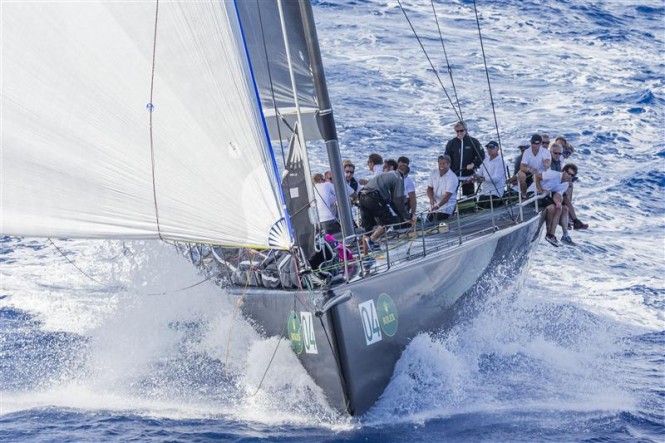 Sir Peter Ogden's JETHOU (GBR) surfing the waves at full speed downwind - Photo by Rolex Carlo Borlenghi