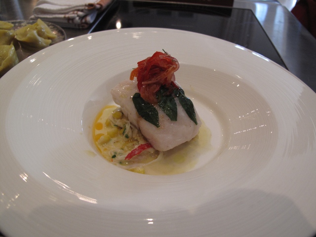 Koh Samui Steamed Fish in Fresh Laksa Leaf with salad of fennel corn with Alaskan King Crab Cucumber and Dill creme fraiche