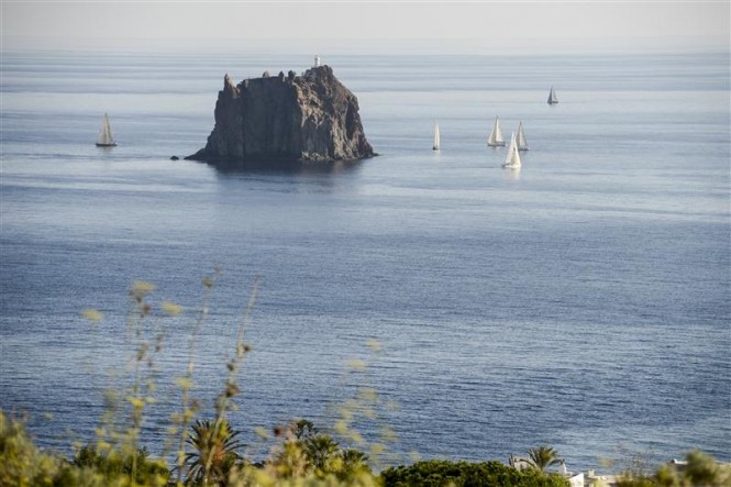 Light conditions as the fleet round Strombolicchio, northeast of Stromboli - Photo by Rolex Kurt Arrigo