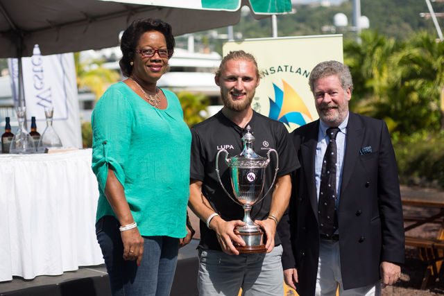 Winner of the RORC Transatlantic Race - Lupa of London, Baltic 78. Fred Pilkington collects a hoard of trophies © RORC/Arthur Daniel & Orlando K Romain