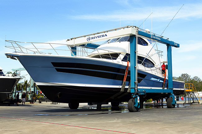 Riviera 77 Enclosed Flybridge Yacht Life Serenity in the travelift
