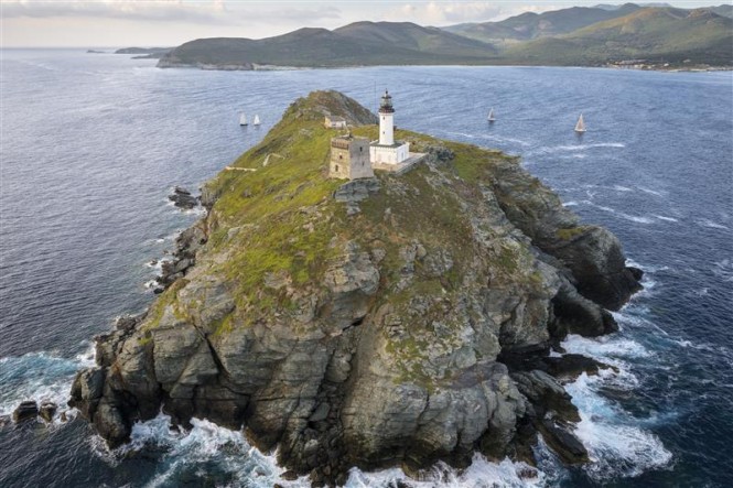 The fleet rounding the Giraglia Rock - Photo by Rolex Kurt Arrigo