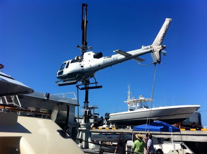 Benoa Harbor Bali - plane loading on superyacht