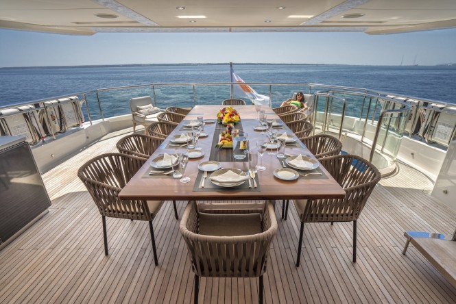 Upper deck aft alfresco dining aboard M/Y ANKA