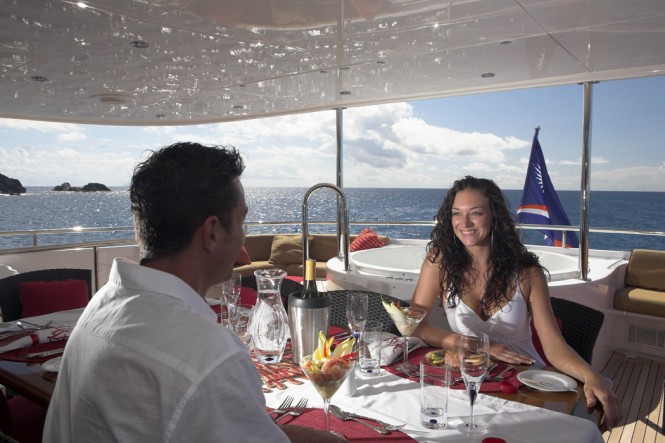 Motor yacht NAMOH - Upper deck aft dining and Jacuzzi
