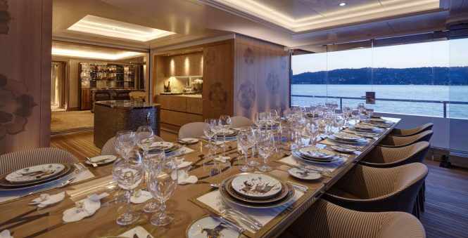 Luxury yacht JOY - The formal dining area opens up for fresh air