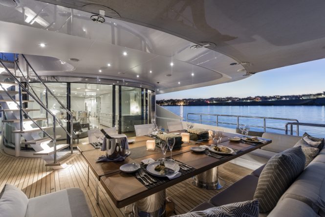 Main deck alfresco dining aboard Superyacht DESTINY