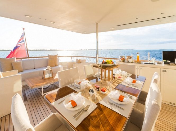 Motor yacht PIONEER - Alfresco dining and lounging on the upper aft deck