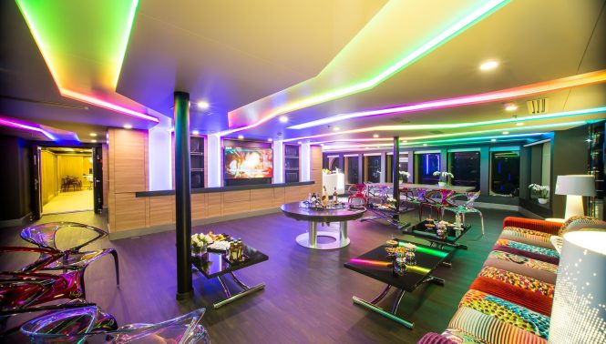 Night time in the main salon aboard motor yacht SALUZI