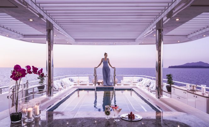Pool deck aboard TITANIA at sunset