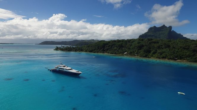 LA DEA II charter yacht with water toys - at anchor