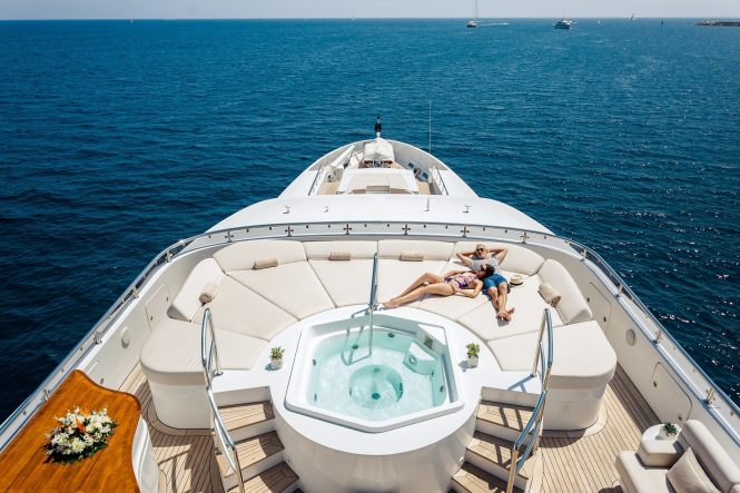 Enjoying the huge sun pads around the Jacuzzi