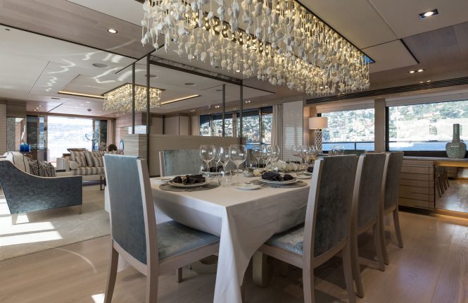 Elegant formal dining room offering deluxe dining experience while on charter